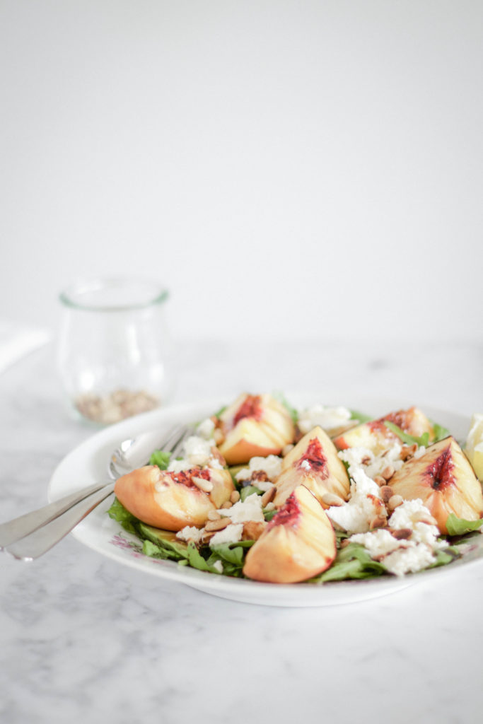 Grilled peach summer salad with mozzarella & arugula