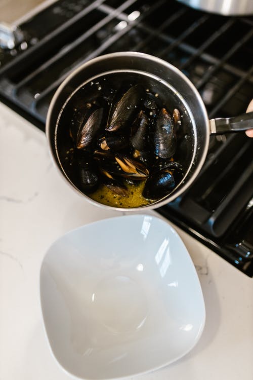 Mussels with Bacon, Sherry, and Rosewater.